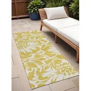 Photo of 8' Runner Gold and White Floral Washable Non Skid Indoor Outdoor Runner Rug