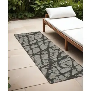 Photo of 8' Runner Gray and Black Abstract Washable Non Skid Indoor Outdoor Runner Rug