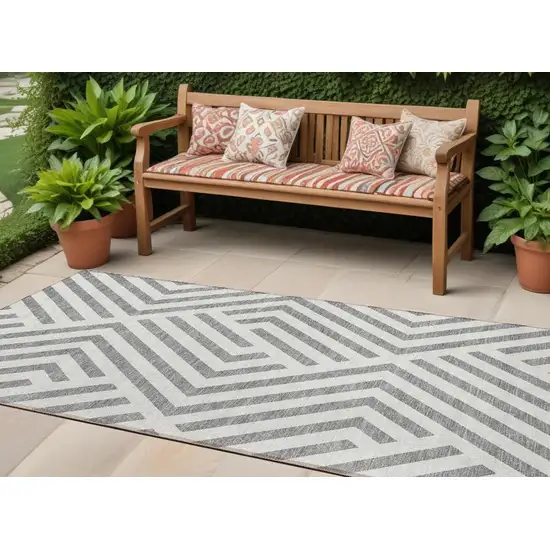 8' Runner Gray and Ivory Geometric Washable Non Skid Indoor Outdoor Runner Rug Photo 1