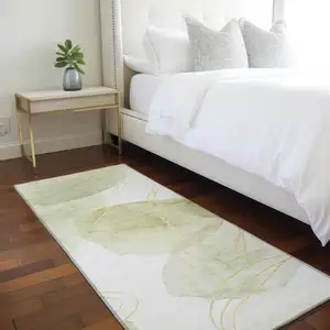 Photo of 8' Runner Green and Ivory Abstract Washable Non Skid Indoor Outdoor Runner Rug