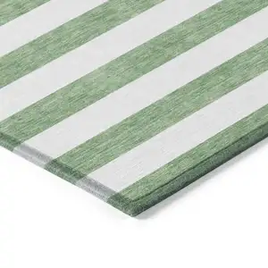 Photo of 8' Runner Green and White Striped Washable Non Skid Indoor Outdoor Runner Rug