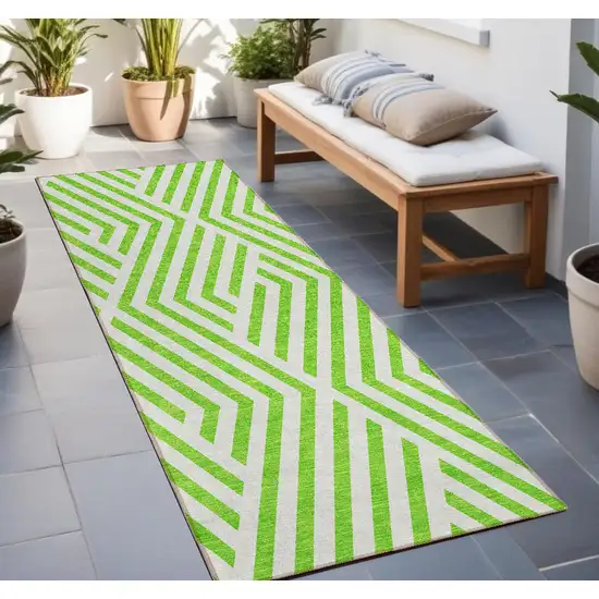 8' Runner Lime Green and White Geometric Washable Non Skid Indoor Outdoor Runner Rug Photo 1