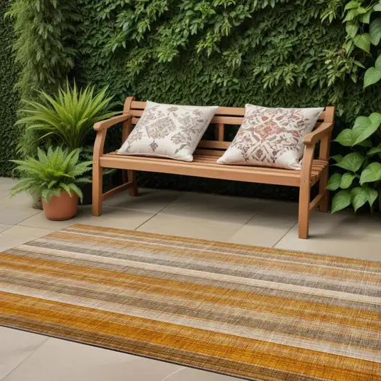 Orange Ivory and Gray Striped Washable Non Skid Indoor Outdoor Runner Rug Photo 1