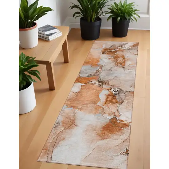 Orange and Ivory Abstract Washable Indoor Outdoor Runner Rug Photo 1