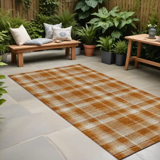 8' Runner Orange and Ivory Plaid Washable Non Skid Indoor Outdoor Runner Rug Photo 1