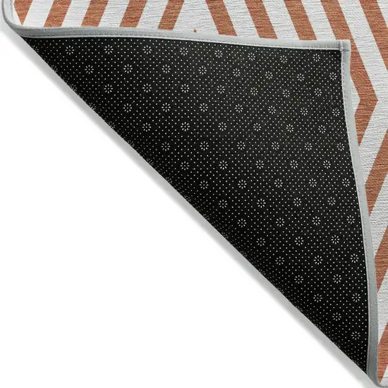 8' Runner Orange and White Geometric Washable Non Skid Indoor Outdoor Runner Rug Photo 4