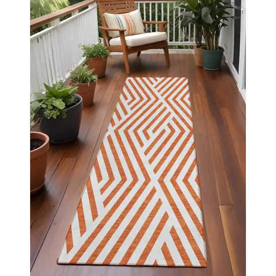 Orange and White Geometric Washable Non Skid Indoor Outdoor Runner Rug Photo 1