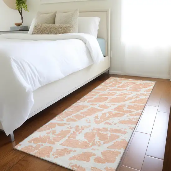 Peach and Ivory Abstract Washable Non Skid Indoor Outdoor Runner Rug Photo 9