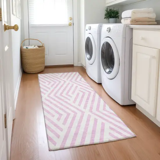 8' Runner Pink and White Geometric Washable Non Skid Indoor Outdoor Runner Rug Photo 9