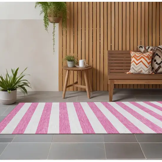 Pink and White Striped Washable Indoor Outdoor Runner Rug Photo 1