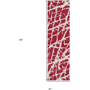 Photo of 8' Runner Red and White Abstract Washable Non Skid Indoor Outdoor Runner Rug