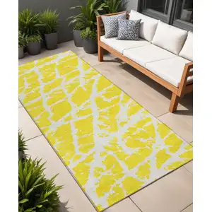 Photo of 8' Runner Yellow and White Abstract Washable Non Skid Indoor Outdoor Runner Rug