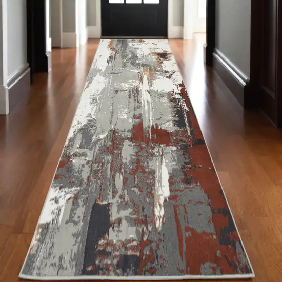 10' Ivory Gray and Rust Abstract Power Loom Runner Rug Photo 1