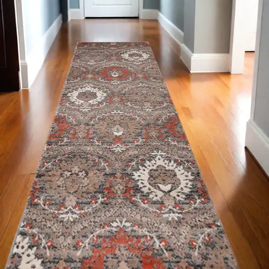 10' Rust And Gray Floral Stain Resistant Runner Rug Photo 1