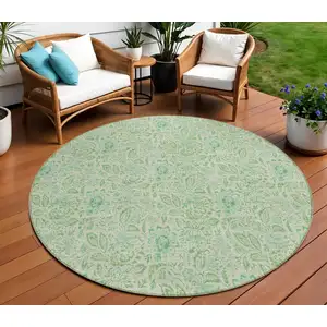 Photo of 8' Sage And Artichoke Green Round Floral Washable Indoor Outdoor Area Rug