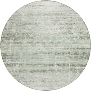 Photo of 8' Sage Artichoke Green And Ivory Round Abstract Washable Indoor Outdoor Area Rug