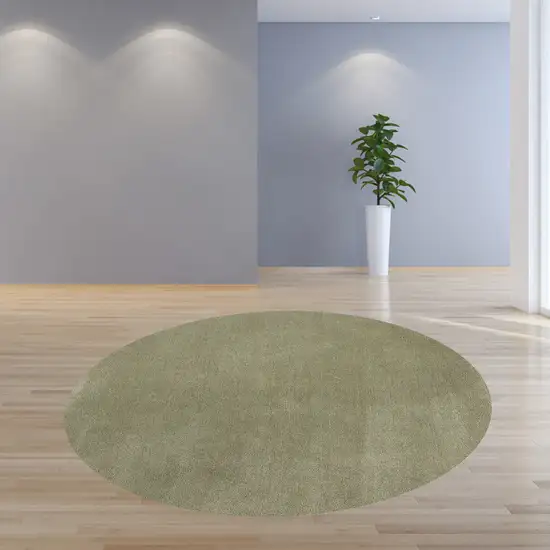 8' Sage Green Round Indoor Shag Rug Photo 6