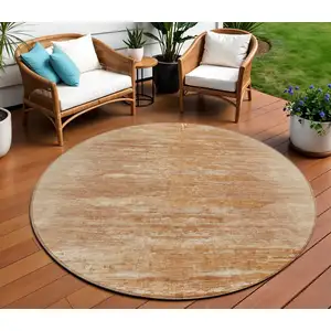 Photo of 8' Salmon And Copper Round Abstract Washable Indoor Outdoor Area Rug