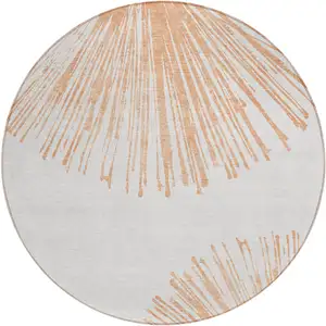 Photo of 8' Salmon And Ivory Round Abstract Washable Indoor Outdoor Area Rug