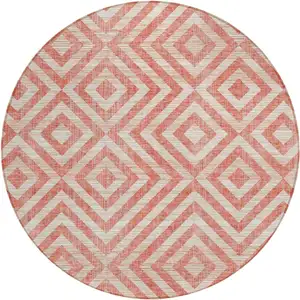 Photo of 8' Salmon And Ivory Round Geometric Washable Indoor Outdoor Area Rug