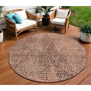 Photo of 8' Salmon Charcoal And Beige Round Geometric Washable Indoor Outdoor Area Rug