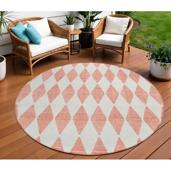 8' Salmon Round Geometric Washable Indoor Outdoor Area Rug Photo 1