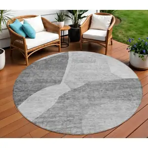 Photo of 8' Silver Gray And Graphite Round Abstract Washable Indoor Outdoor Area Rug