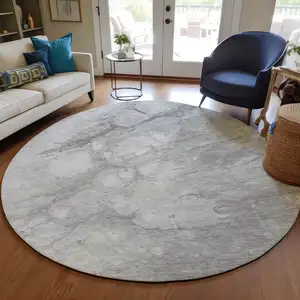 Photo of 8' Silver Gray And Ivory Round Abstract Washable Indoor Outdoor Area Rug