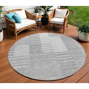 Photo of 8' Silver Gray And Ivory Round Striped Washable Indoor Outdoor Area Rug