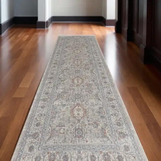 12' Silver Taupe and Blue Oriental Power Loom Worn Faded Runner Rug With Fringe Photo 1