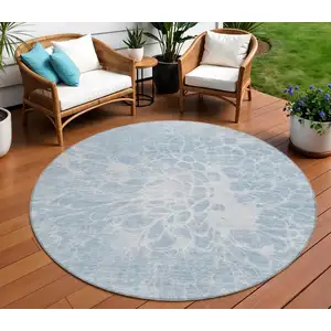 Photo of 8' Sky Blue And Denim Blue Round Abstract Washable Indoor Outdoor Area Rug