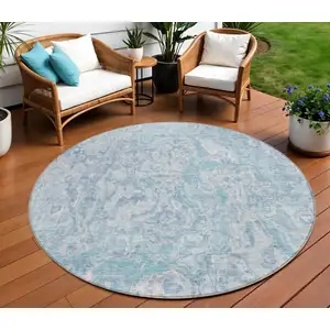 Photo of 8' Sky Blue And Denim Blue Round Abstract Washable Indoor Outdoor Area Rug