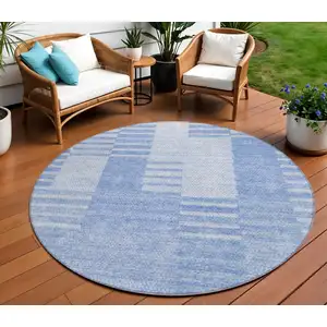 Photo of 8' Sky Blue And Denim Blue Round Striped Washable Indoor Outdoor Area Rug