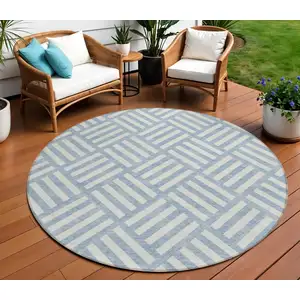 Photo of 8' Sky Blue And Ivory Round Geometric Washable Indoor Outdoor Area Rug