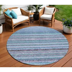 Photo of 8' Sky Blue And Navy Blue Round Striped Washable Indoor Outdoor Area Rug