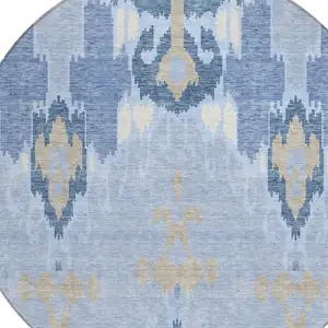 Photo of 8' Sky Blue Denim Blue And Ivory Round Ikat Washable Indoor Outdoor Area Rug