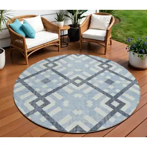 Photo of 8' Sky Blue Navy Blue And Ivory Round Geometric Washable Indoor Outdoor Area Rug