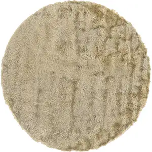 Photo of 8' Tan And Taupe Round Shag Tufted Handmade Area Rug