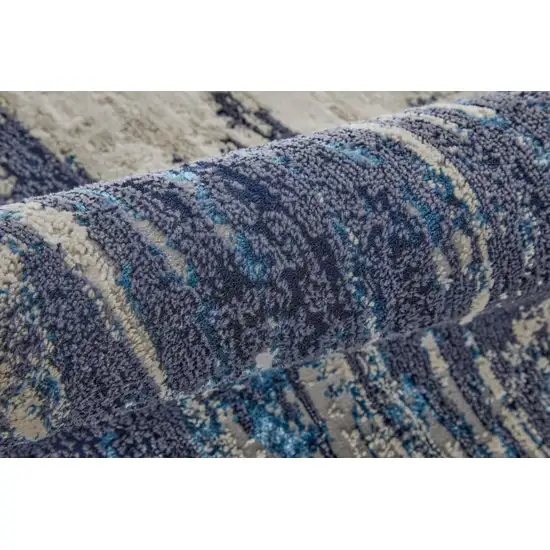 8' Tan Blue And Ivory Abstract Power Loom Distressed Runner Rug Photo 5