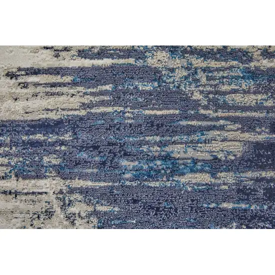 8' Tan Blue And Ivory Abstract Power Loom Distressed Runner Rug Photo 6