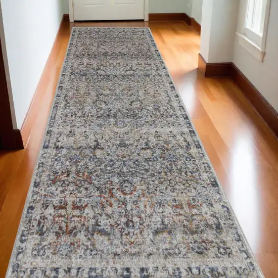 10' Tan and Blue Floral Power Loom Distressed Non Skid Runner Rug Photo 1