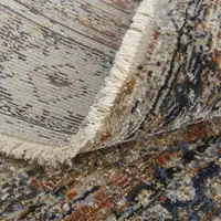 Photo of 10' Tan Blue and Brown Oriental Power Loom Runner Rug With Fringe