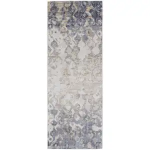 Photo of 10' Tan Ivory And Blue Abstract Power Loom Distressed Runner Rug