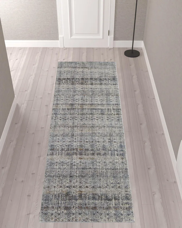 10' Tan Ivory And Blue Geometric Power Loom Distressed Runner Rug With Fringe Photo 2