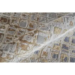 Photo of 8' Tan Ivory And Blue Geometric Power Loom Distressed Runner Rug