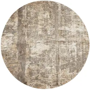 Photo of 8' Tan Ivory And Brown Round Abstract Area Rug