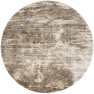 Photo of 8' Tan Ivory And Brown Round Abstract Area Rug