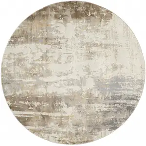 Photo of 8' Tan Ivory And Gray Round Abstract Area Rug