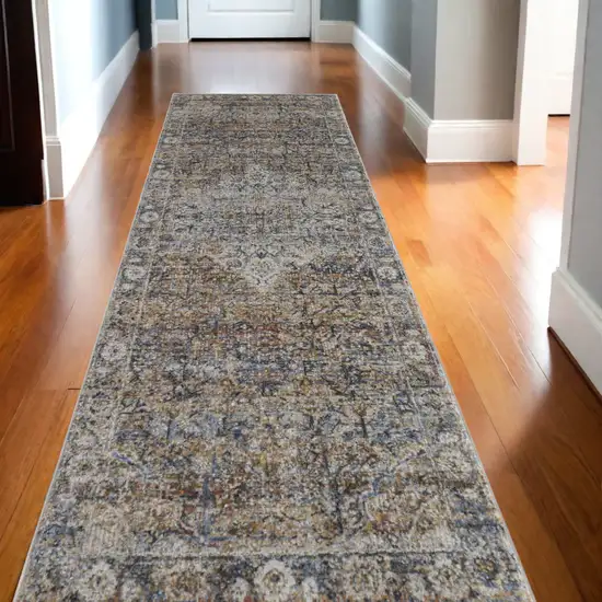 10' Tan and Blue Floral Power Loom Distressed Non Skid Runner Rug Photo 1