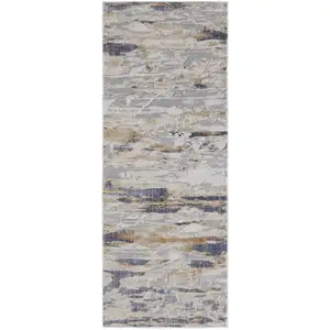 Photo of 10' Tan Orange And Ivory Abstract Power Loom Distressed Runner Rug